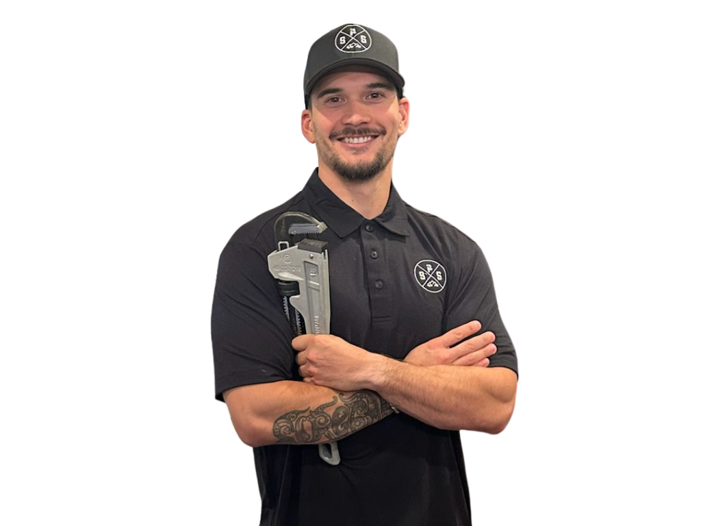 Smart Restoration water damage technician holding a pipe wrench